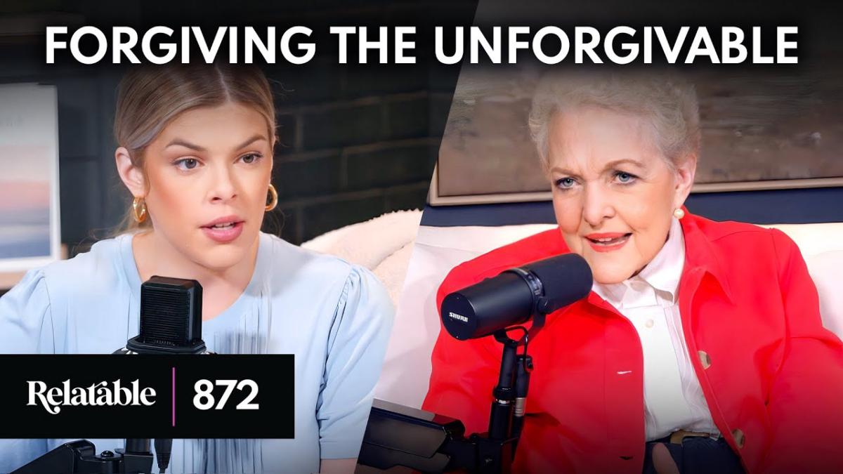 Two women sit in a podcast studio, each speaking into a microphone. One wears a light blue top and appears focused, while the other wears a bright red jacket and speaks expressively. Text above them reads: ‘Forgiving the Unforgivable,’ and a label in the corner displays ‘Relatable 872.’